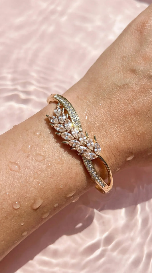 Curved Pave Crystal Inlaid Stainless Steel Gold Plated Hinged Bangle