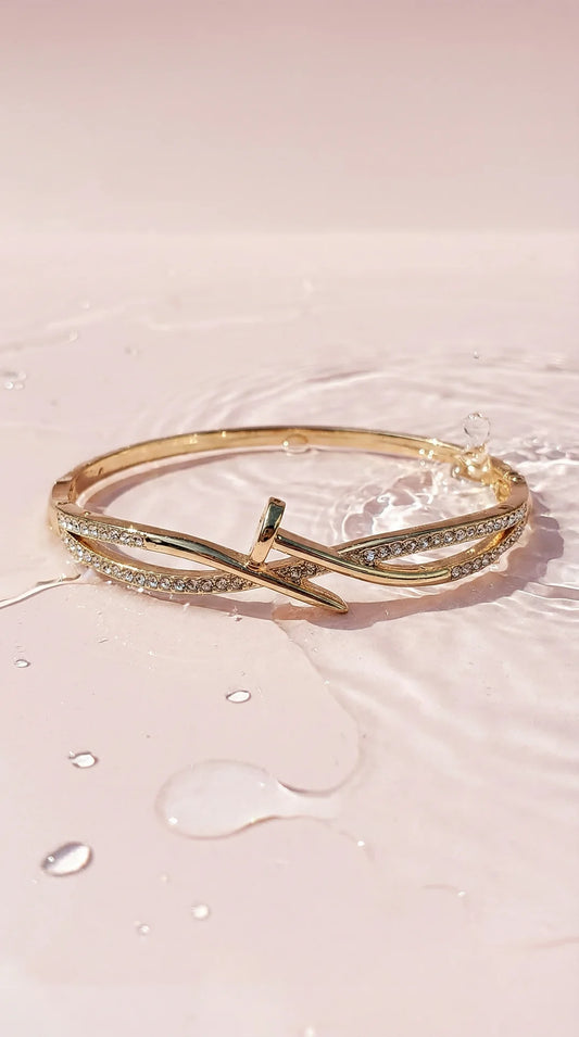 Twisted Pave Crystal Inlaid Stainless Steel Gold Plated Hinged Bangle