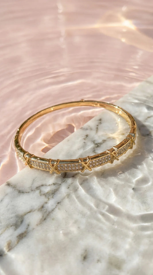 Criss Cross Crystal Inlaid Stainless Steel Gold Plated Hinged Bangle