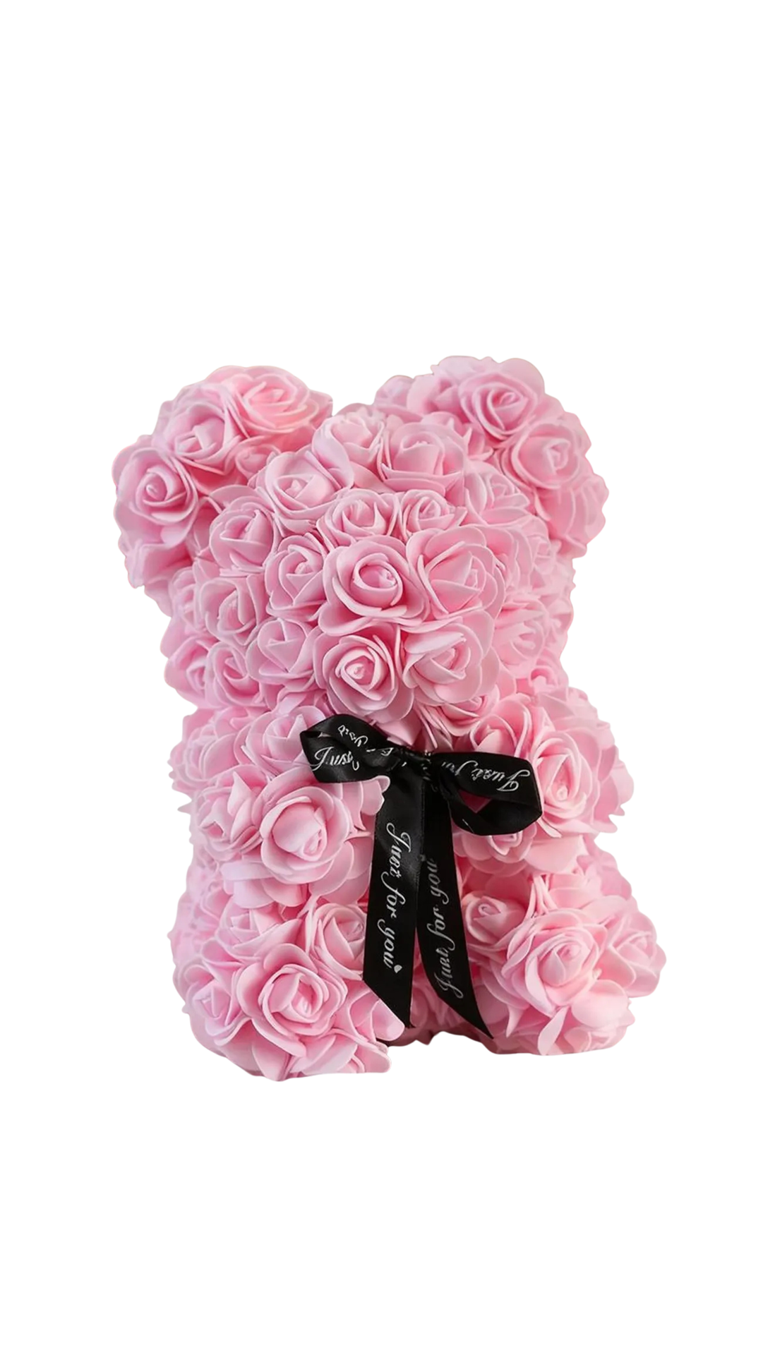 Pink rose teddy bear with a black ribbon on a white background