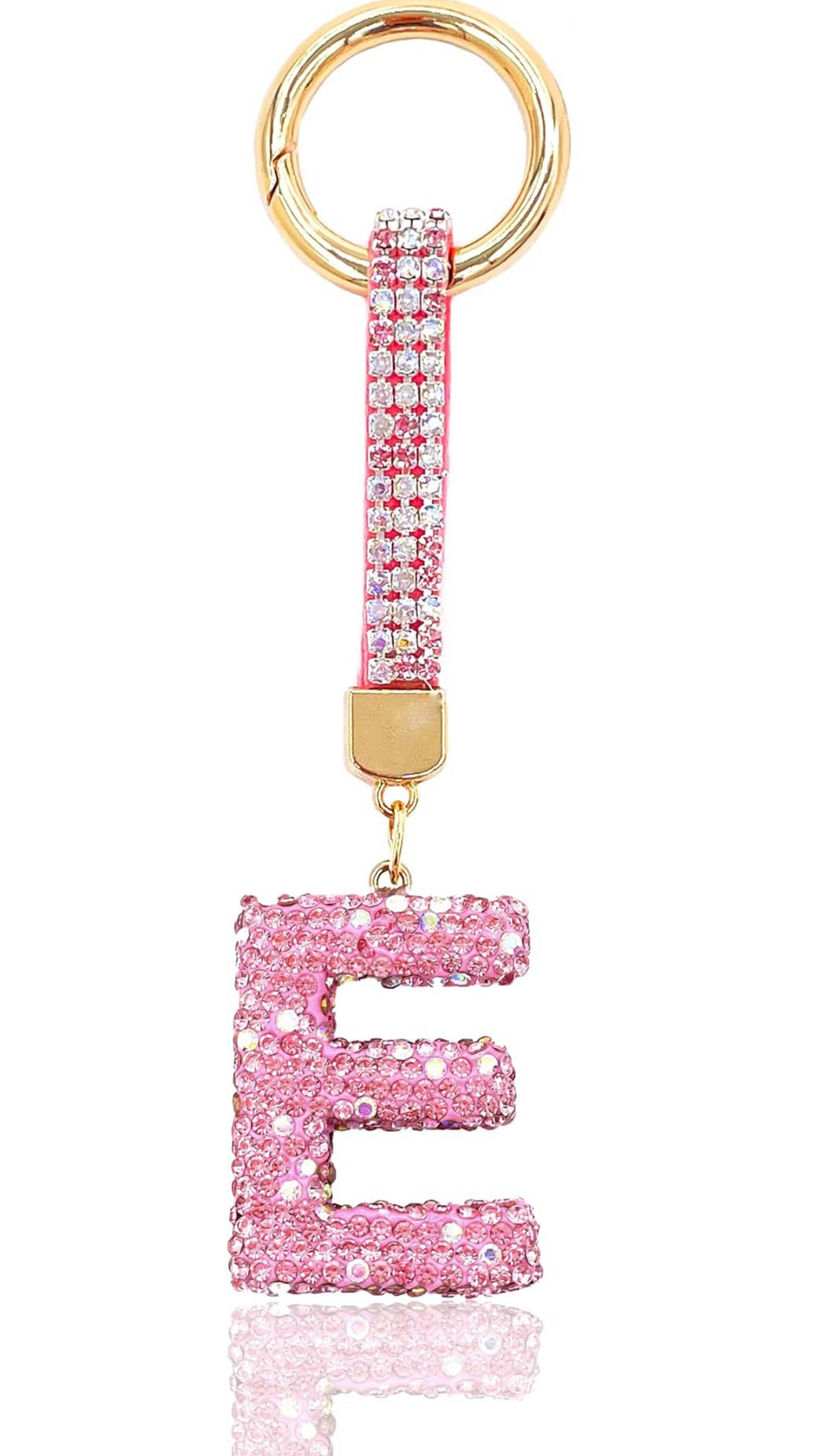 Keychain with pink letter 'E' charm on a white background