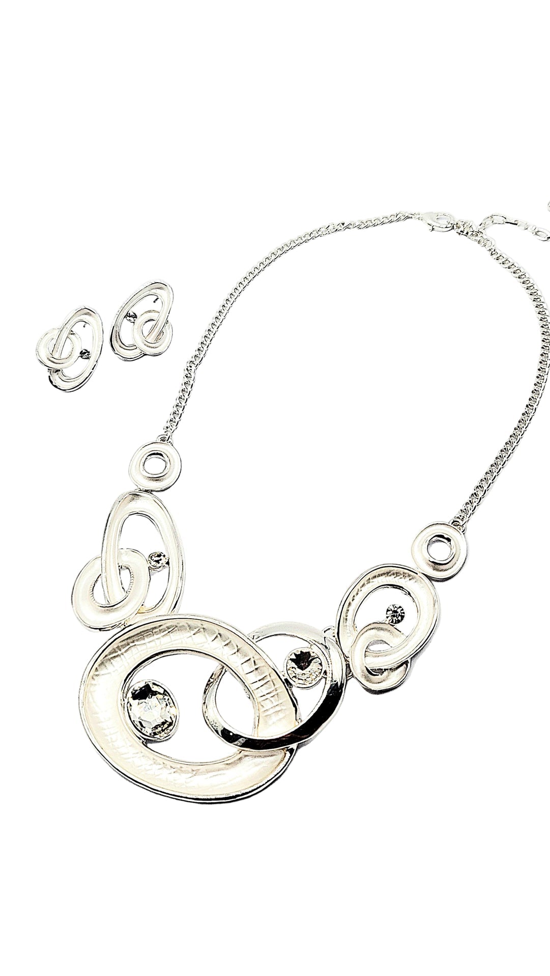 Silver necklace with interlocking rings on a white background