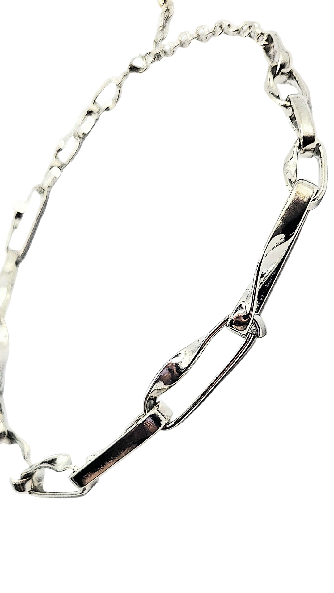 Silver chain necklace on a white background